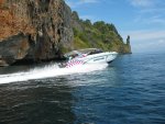 One of the many other speed boat in the region speeding off