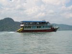 One of the many "crowded" boat passes us