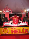 Ferrari with cardboard of the drivers