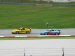 2 Porsche racing each other