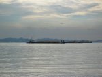 Sand Budge, plane taking off in background